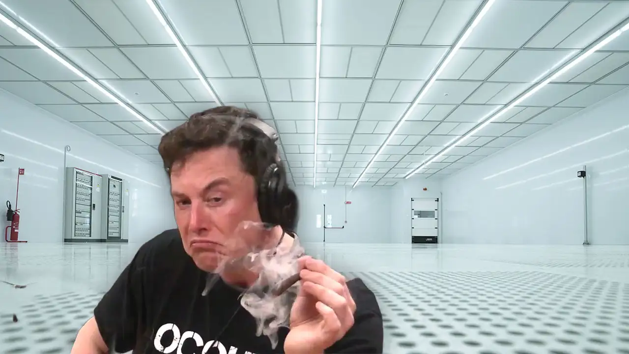 Elon-Musk-pusi-cigaru-u-cistoj-sobi-za-proizvodnju-cipova.webp