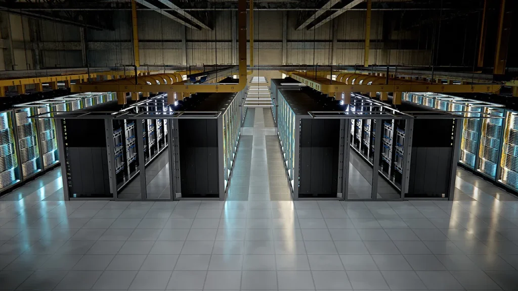 AMD-Helios-rack Rows of server racks in a modern data center, seen from above along a central aisle with blue LEDs